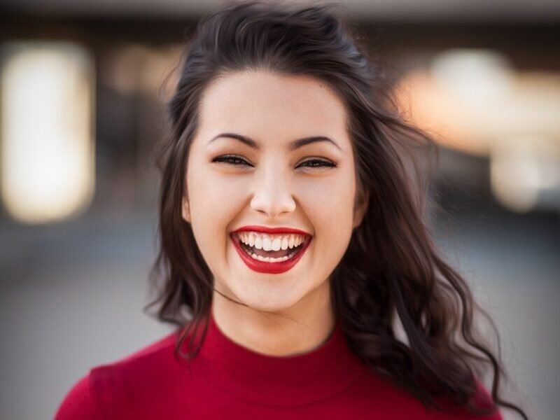 closeup photography of woman smiling