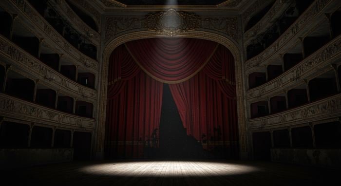 A grand decaying theater interior at night, dramatic red curtain, single spotlight on an empty stage, ornate but worn gold details, shadows filling the balconies, dark cinematic aesthetic