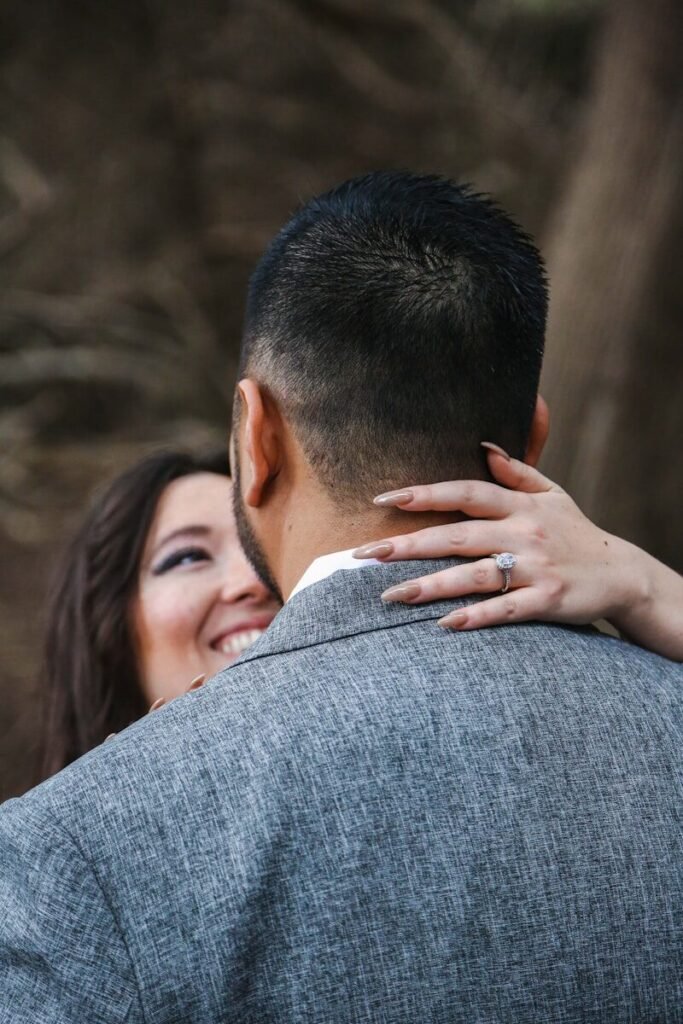 a man and a woman embracing each other