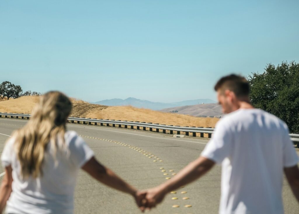 a man and woman holding hands