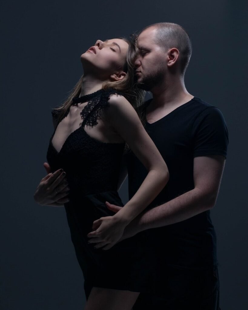 a man and woman kissing