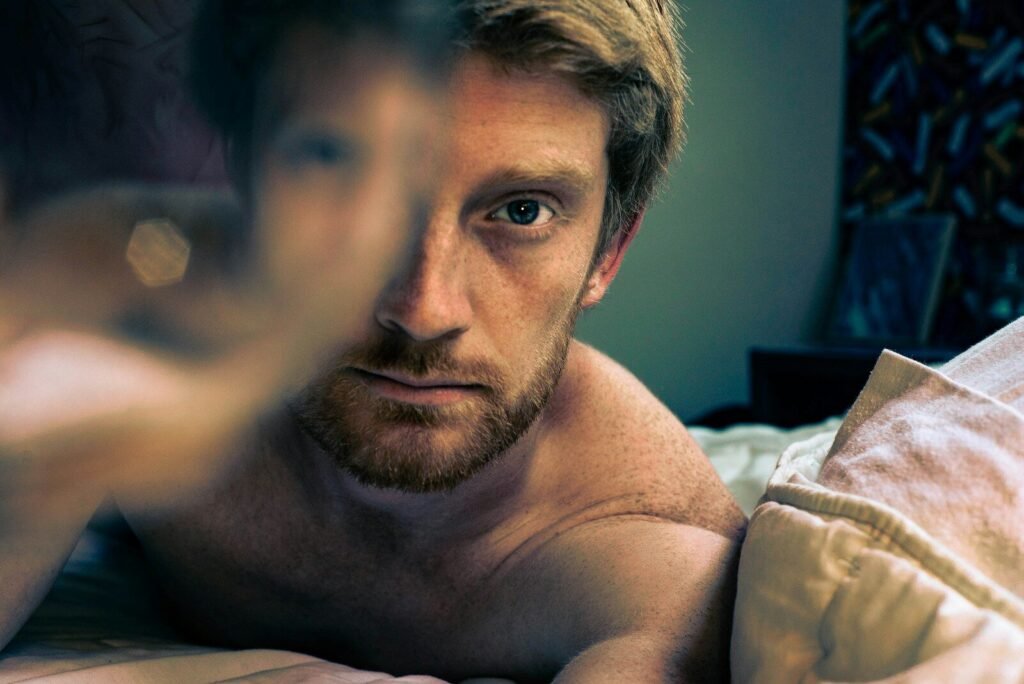 man lying on bed