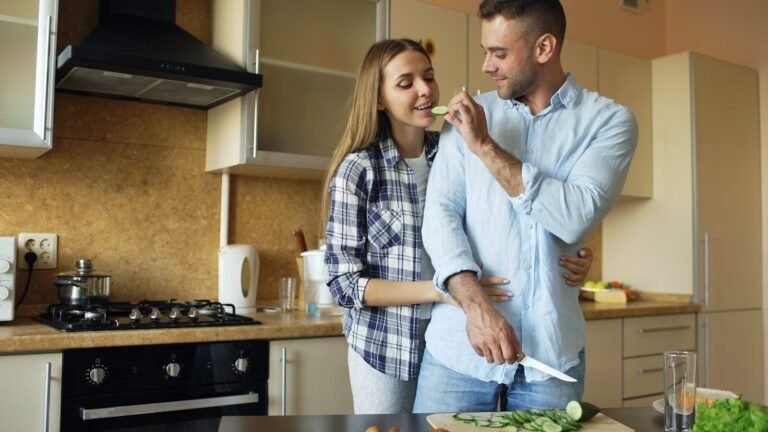Couple cooking together in a modern kitchen